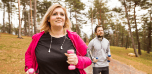 woman-walking-weights-outdoor