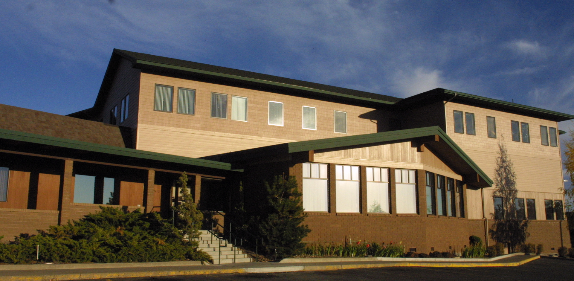 Exterior of the Cancer Treatment Center. A large brown building built in the 1980s.